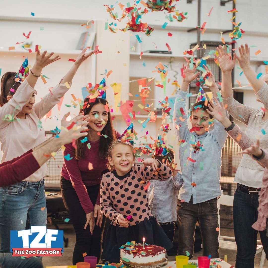 The Zoo Factory birthday party, kids celebrating with confetti