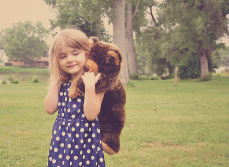 Girl with Stuffed Bear