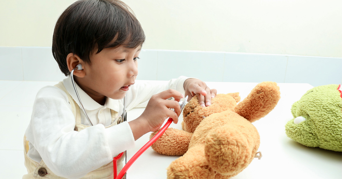 Playing Doctor with Stuffed Animal