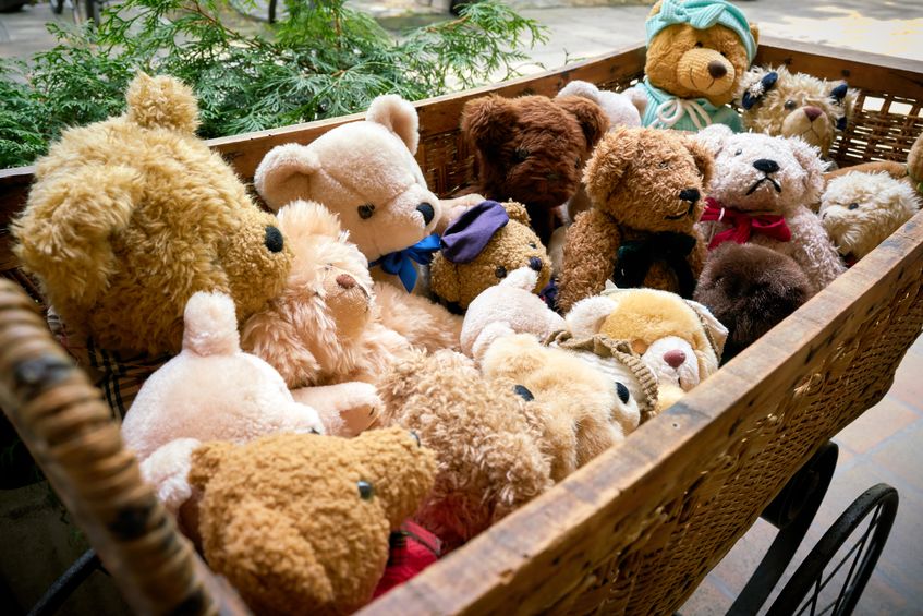 bears as a souvenir in a doll carriage in front of a souvenir shop in berlin
